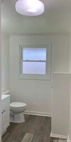 a bathroom with a toilet