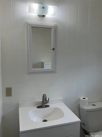 a bathroom with a sink and a toilet