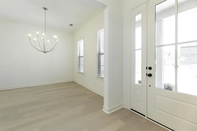 a view of a chandelier in a room