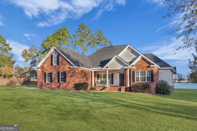 front view of a house with a big yard