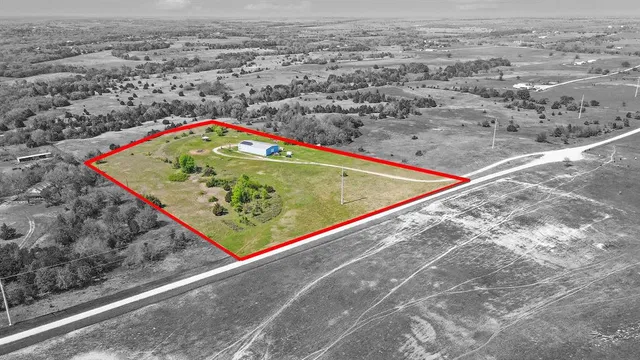 a view of swimming pool with a yard