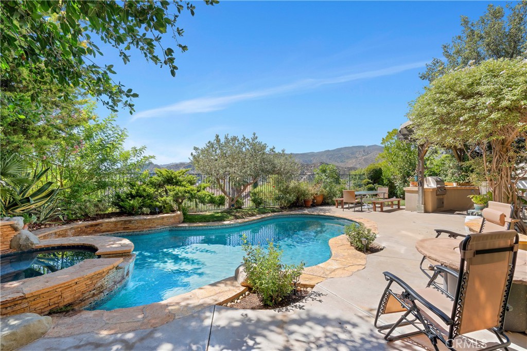 25730 Hawthorne Place Stevenson Ranch, CA 91381 - Photo 34 of 41 Pool and spa and panoramic views