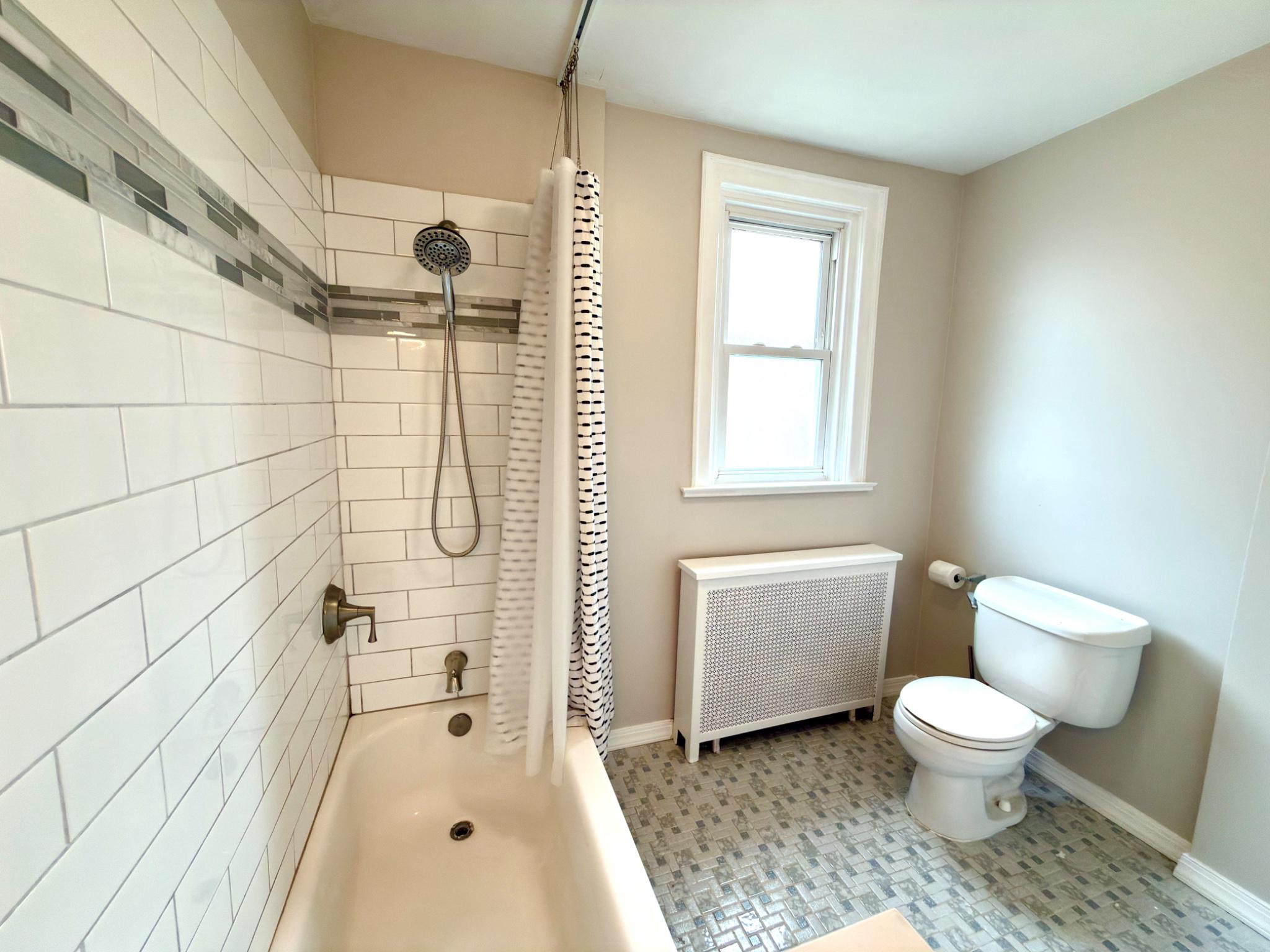 1723 Chelsea Road Elkins Park, PA 19027 - Photo 23 of 38 a bathroom with a toilet and a shower