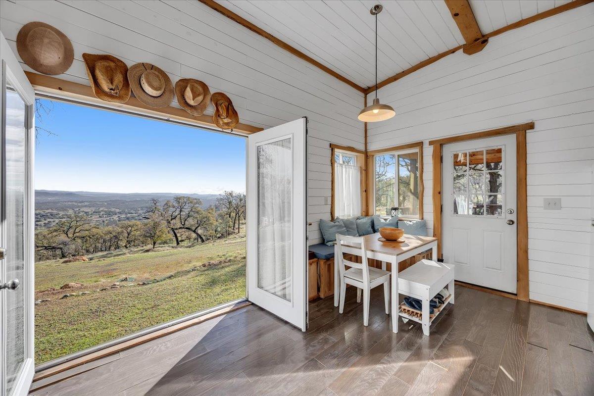 2460 Sulkey Court Copperopolis, CA 95228 - Photo 11 of 91 a view of a dining room with furniture window and outside view