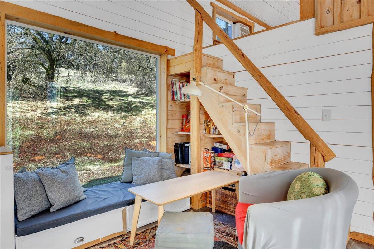 2460 Sulkey Court Copperopolis, CA 95228 - Photo 22 of 91 a living room with furniture and a large window