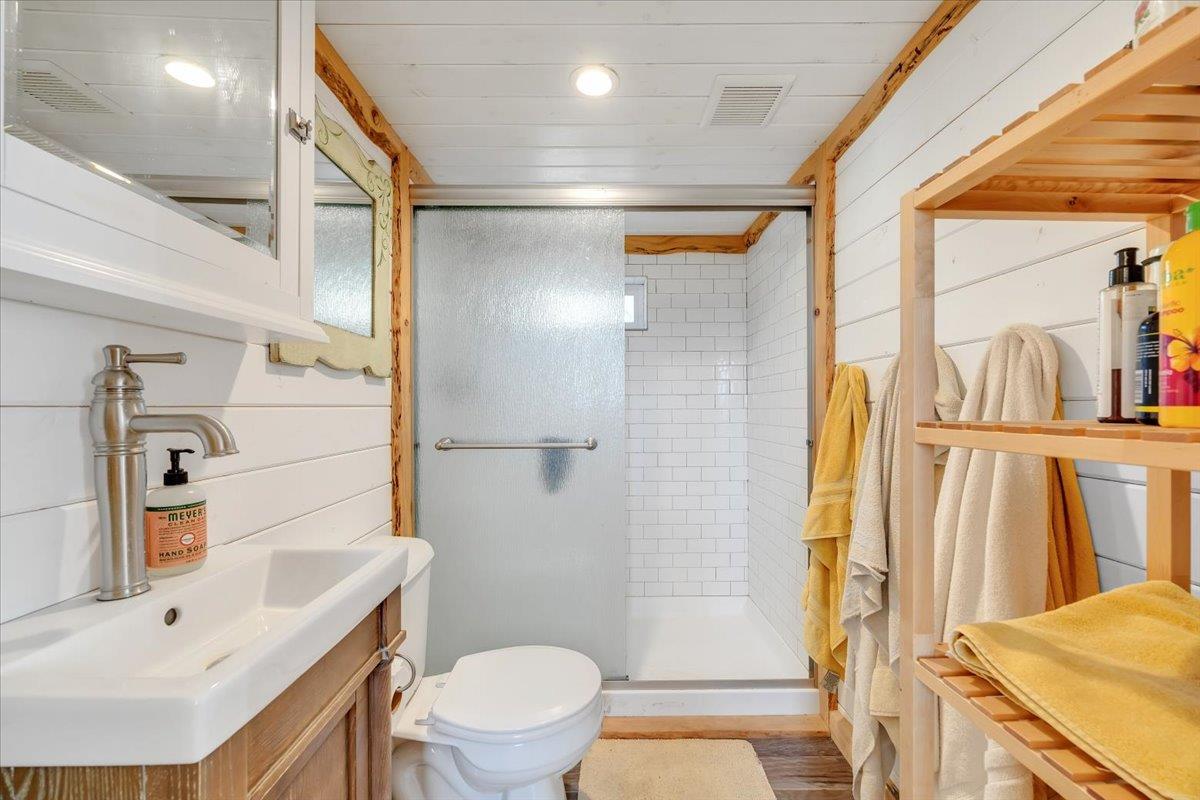 2460 Sulkey Court Copperopolis, CA 95228 - Photo 25 of 91 a bathroom with a sink toilet and shower