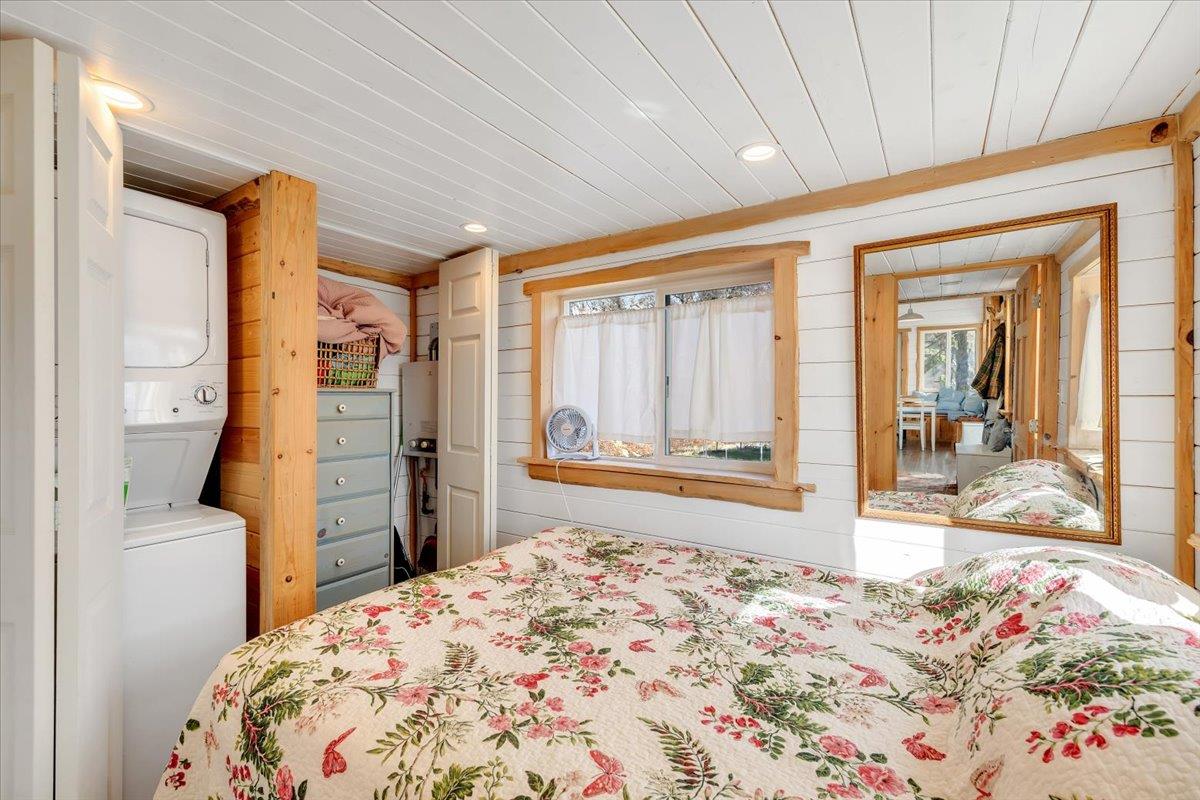 2460 Sulkey Court Copperopolis, CA 95228 - Photo 26 of 91 a bedroom with a bed and a dresser