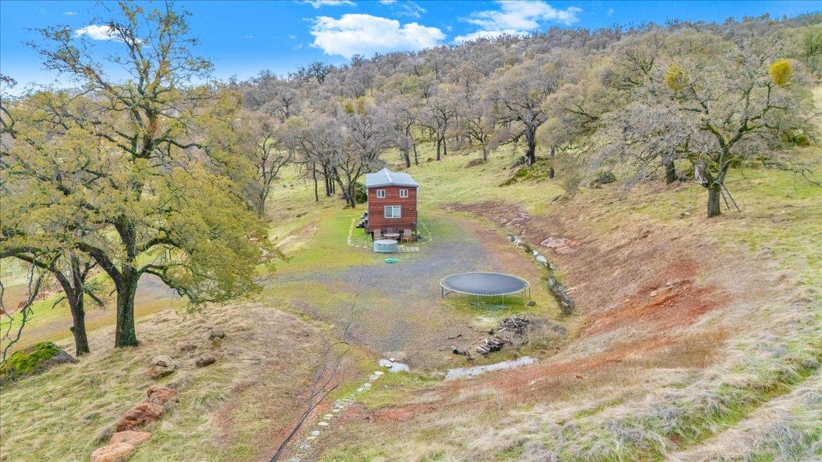 2460 Sulkey Court Copperopolis, CA 95228 - Photo 56 of 91 a view of a yard with swimming pool