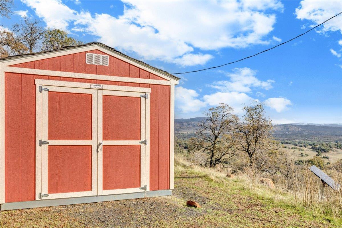 2460 Sulkey Court Copperopolis, CA 95228 - Photo 60 of 91 a front view of a house with a yard