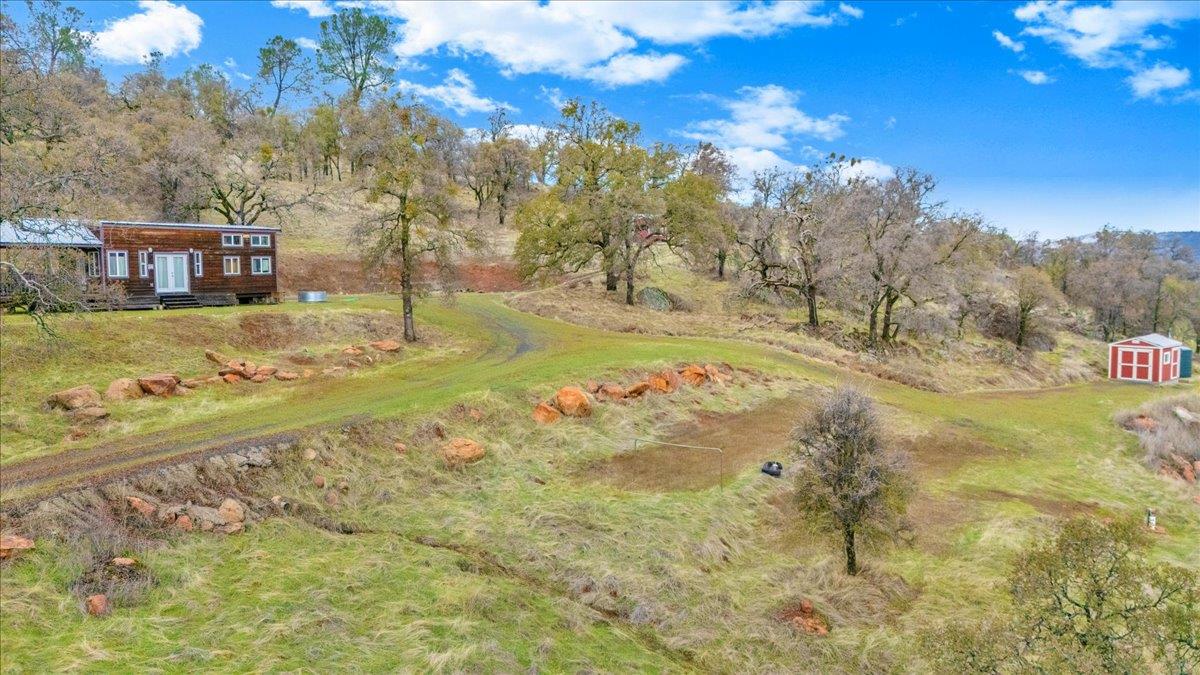 2460 Sulkey Court Copperopolis, CA 95228 - Photo 6 of 91 a view of a yard with swimming pool
