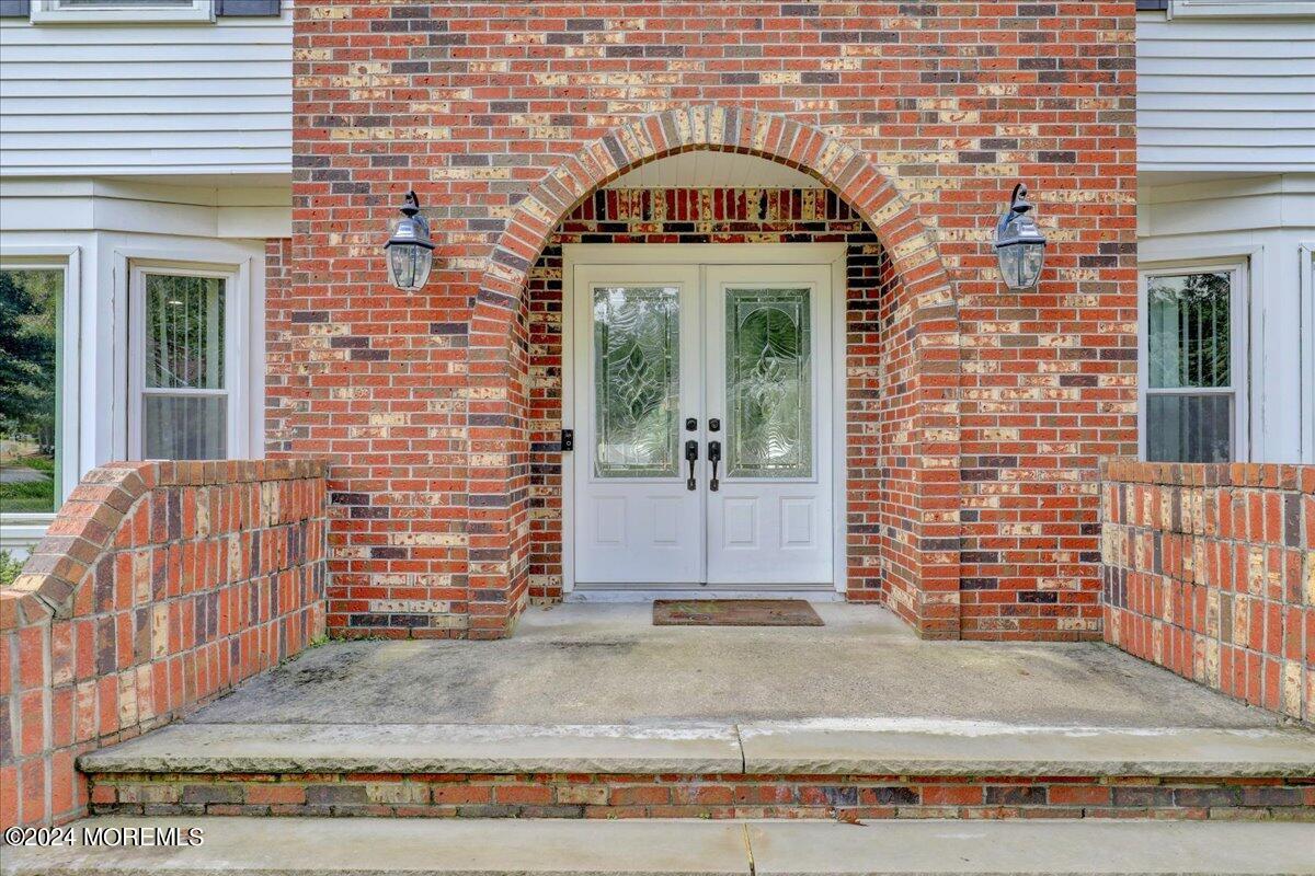 61 Apache Drive Manalapan, NJ 07726 - Photo 2 of 37 a view of entrance