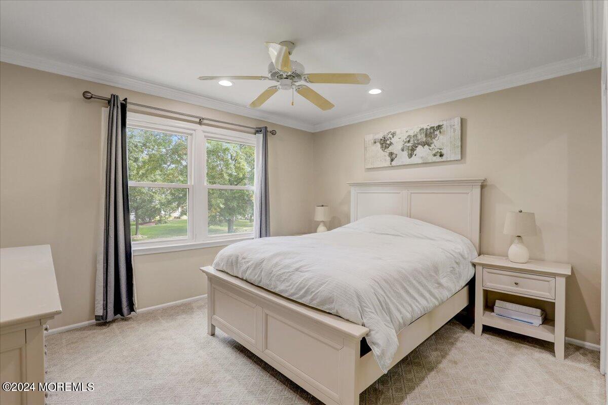 61 Apache Drive Manalapan, NJ 07726 - Photo 27 of 37 a bedroom with a bed and a window