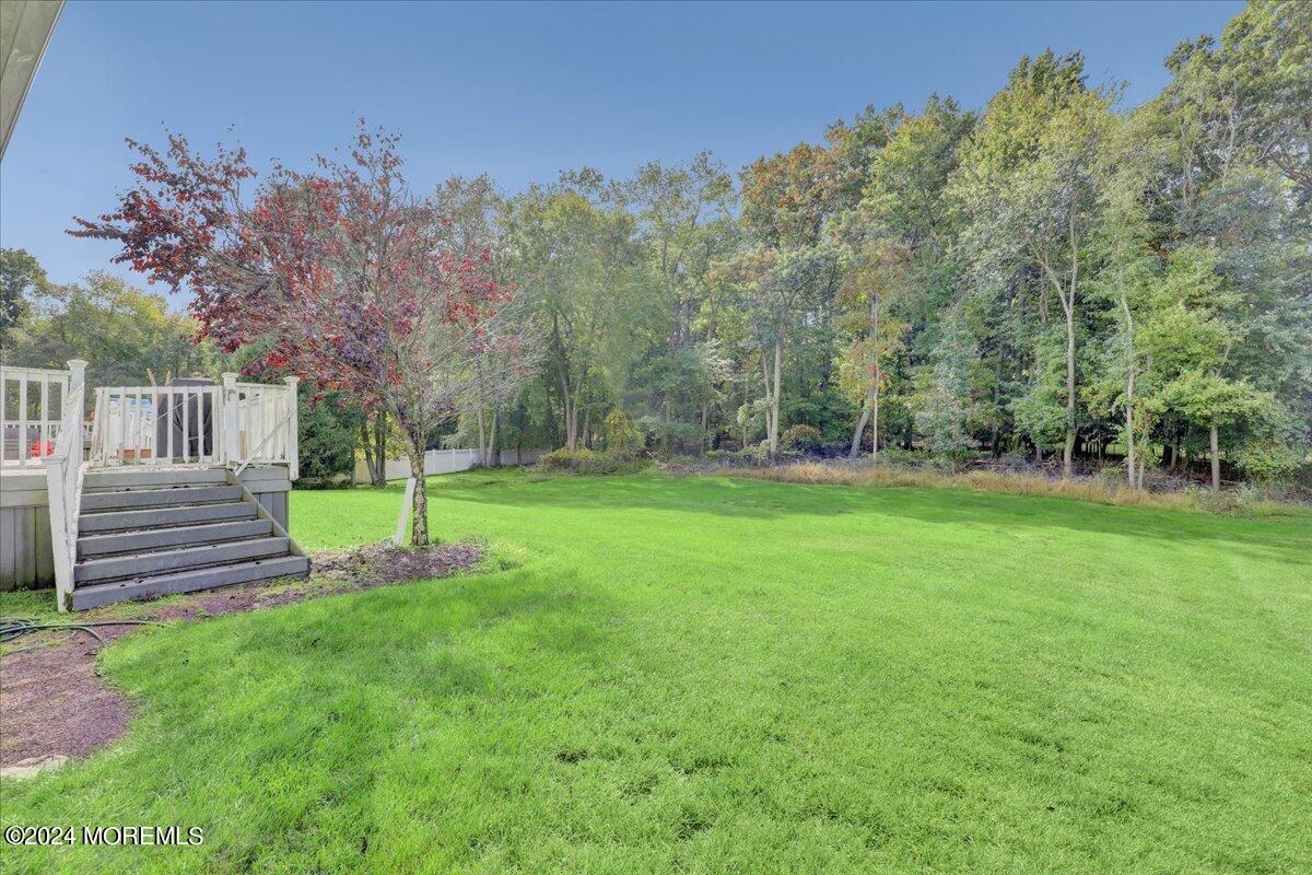 61 Apache Drive Manalapan, NJ 07726 - Photo 34 of 37 a view of a park with large trees