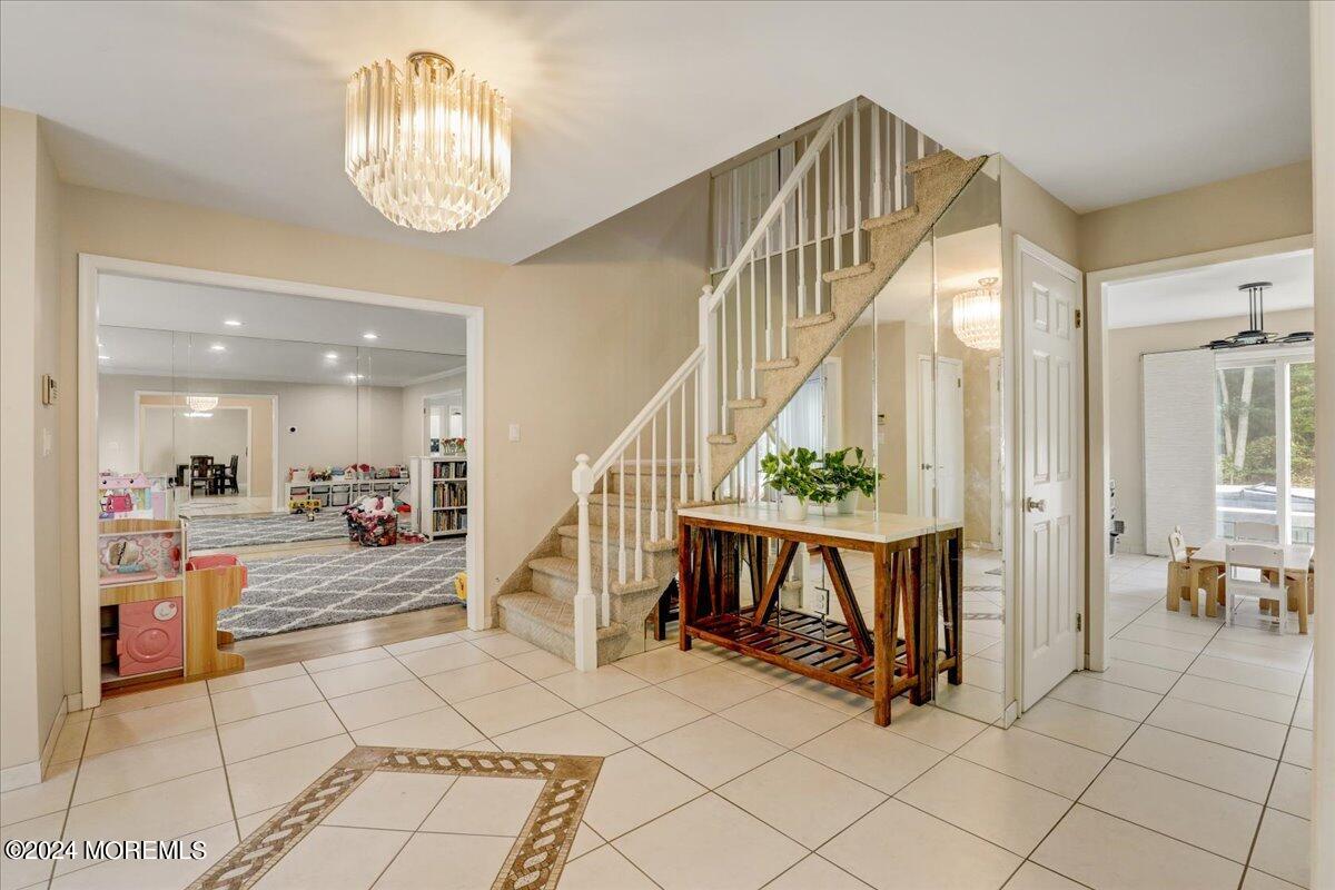 61 Apache Drive Manalapan, NJ 07726 - Photo 5 of 37 a view of living room and hardwood floor