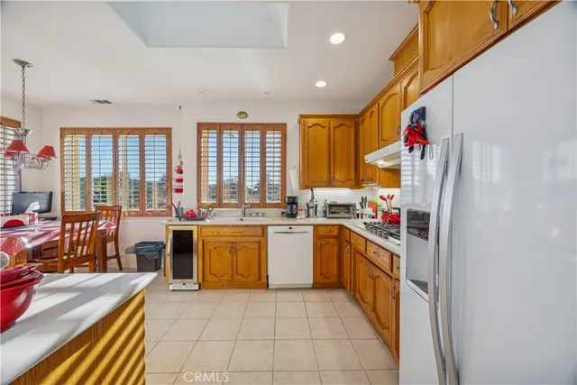 a kitchen with sink cabinets and window