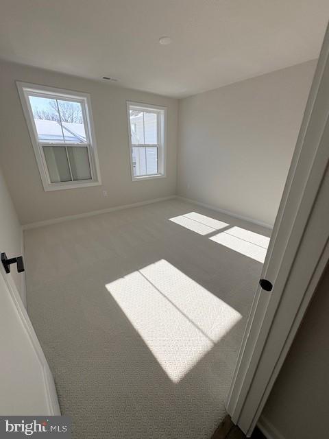 30 Grayson Lane Downingtown, PA 19335 - Photo 17 of 29 a view of an empty room with windows