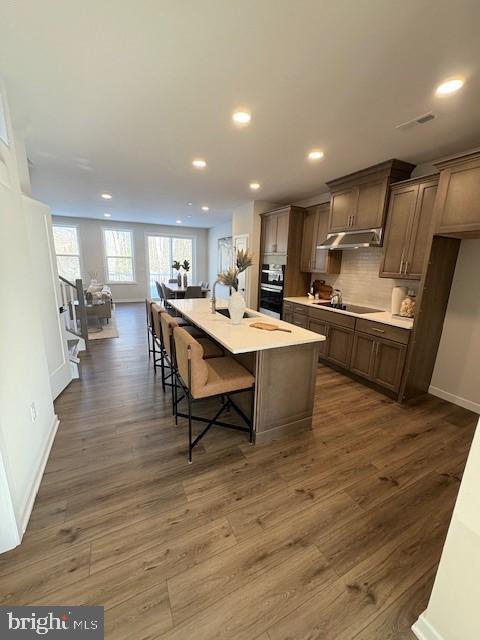 30 Grayson Lane Downingtown, PA 19335 - Photo 3 of 29 a large kitchen with a table and chairs
