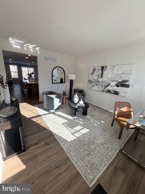 30 Grayson Lane Downingtown, PA 19335 - Photo 9 of 29 a living room with kitchen furniture and a wooden floor