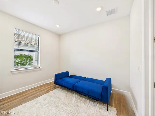 a room with furniture and a window