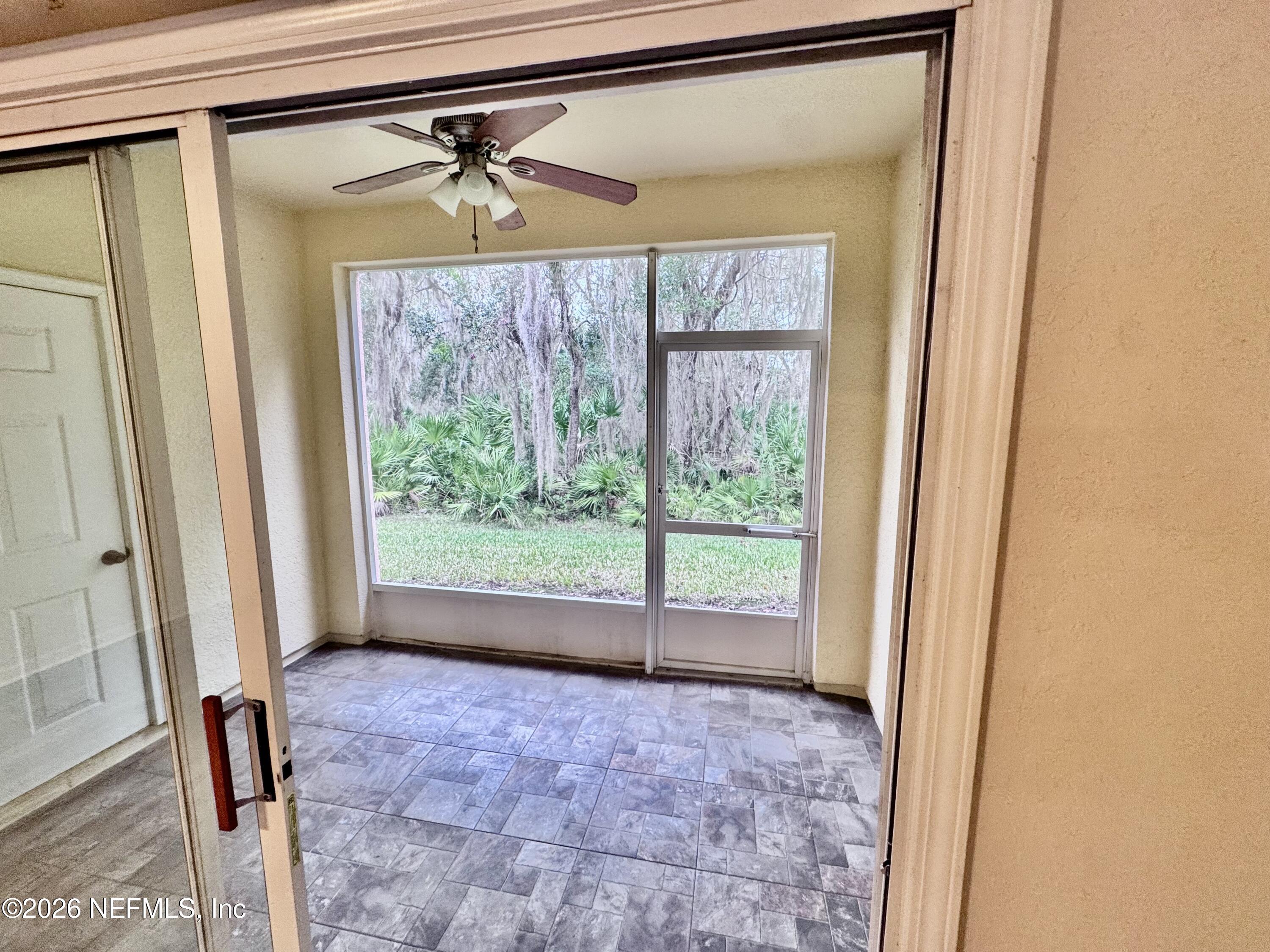 110 Magnolia Crossing Point, Unit 1903 St. Augustine, FL 32086 - Photo 13 of 31 a view of empty room with front door