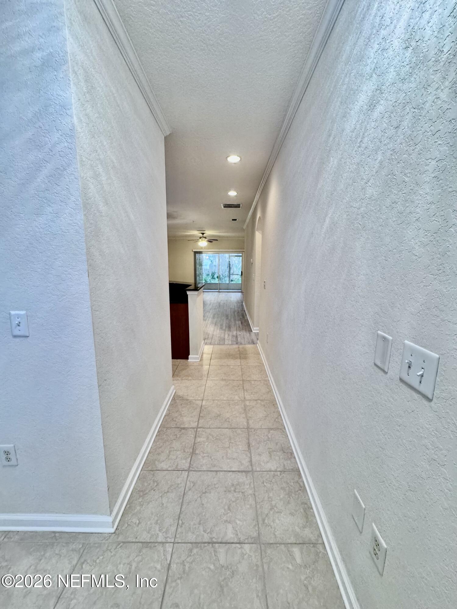 110 Magnolia Crossing Point, Unit 1903 St. Augustine, FL 32086 - Photo 20 of 26 a view of a hallway