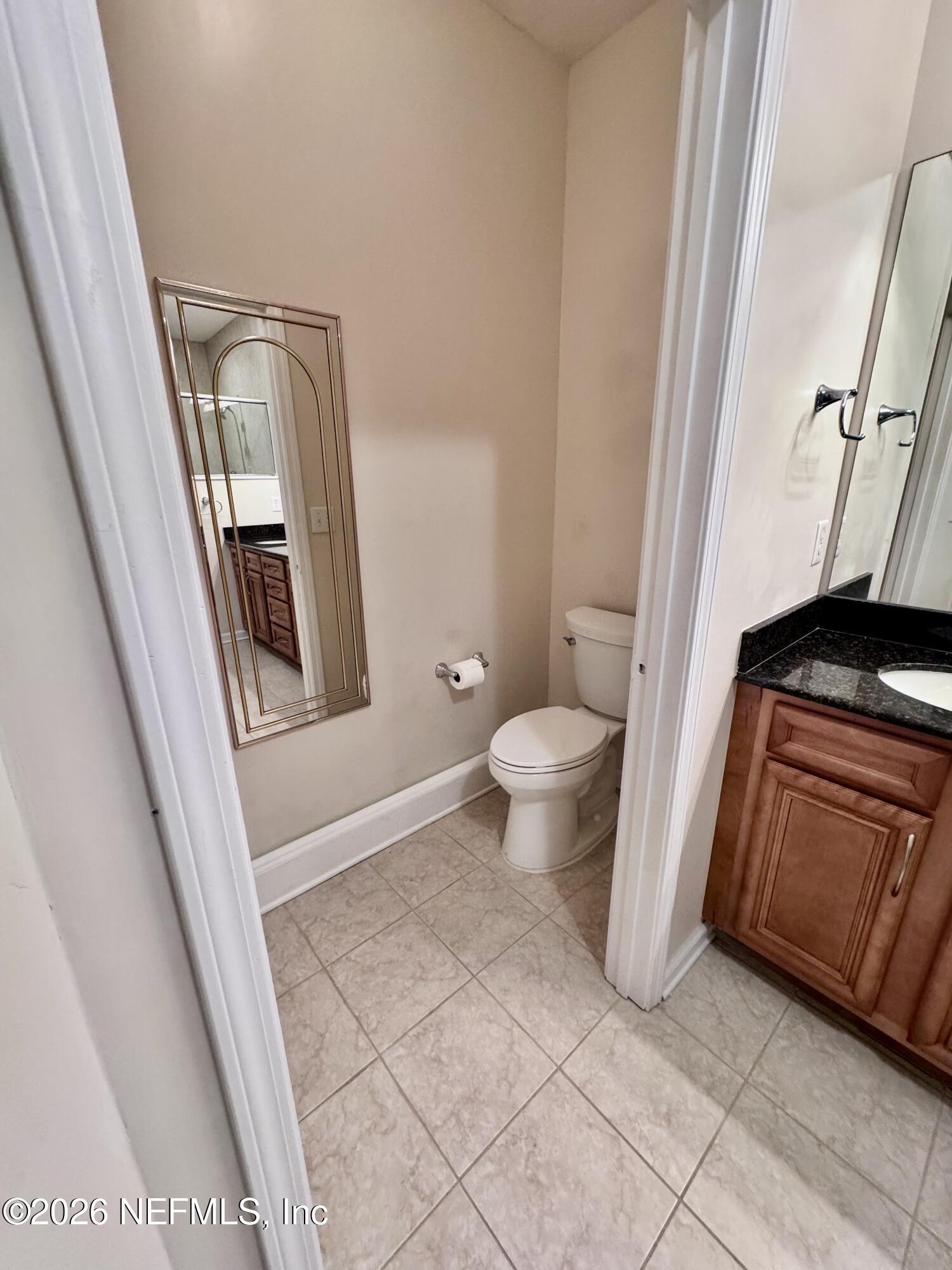 110 Magnolia Crossing Point, Unit 1903 St. Augustine, FL 32086 - Photo 9 of 31 a view of an empty room and window