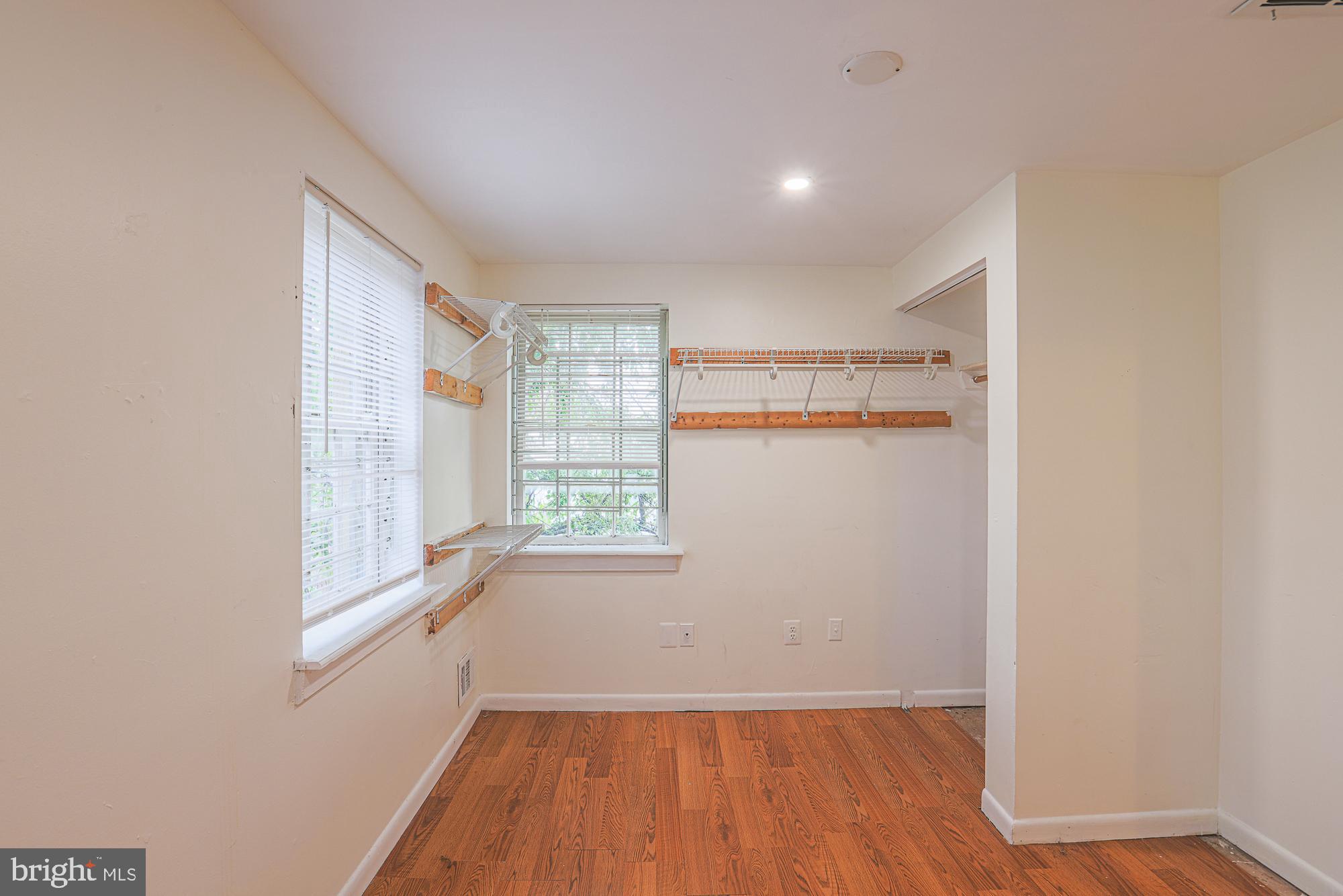 337 Scott Street Baltimore, MD 21230 - Photo 20 of 31 a view of a room with wooden floor and windows in a room