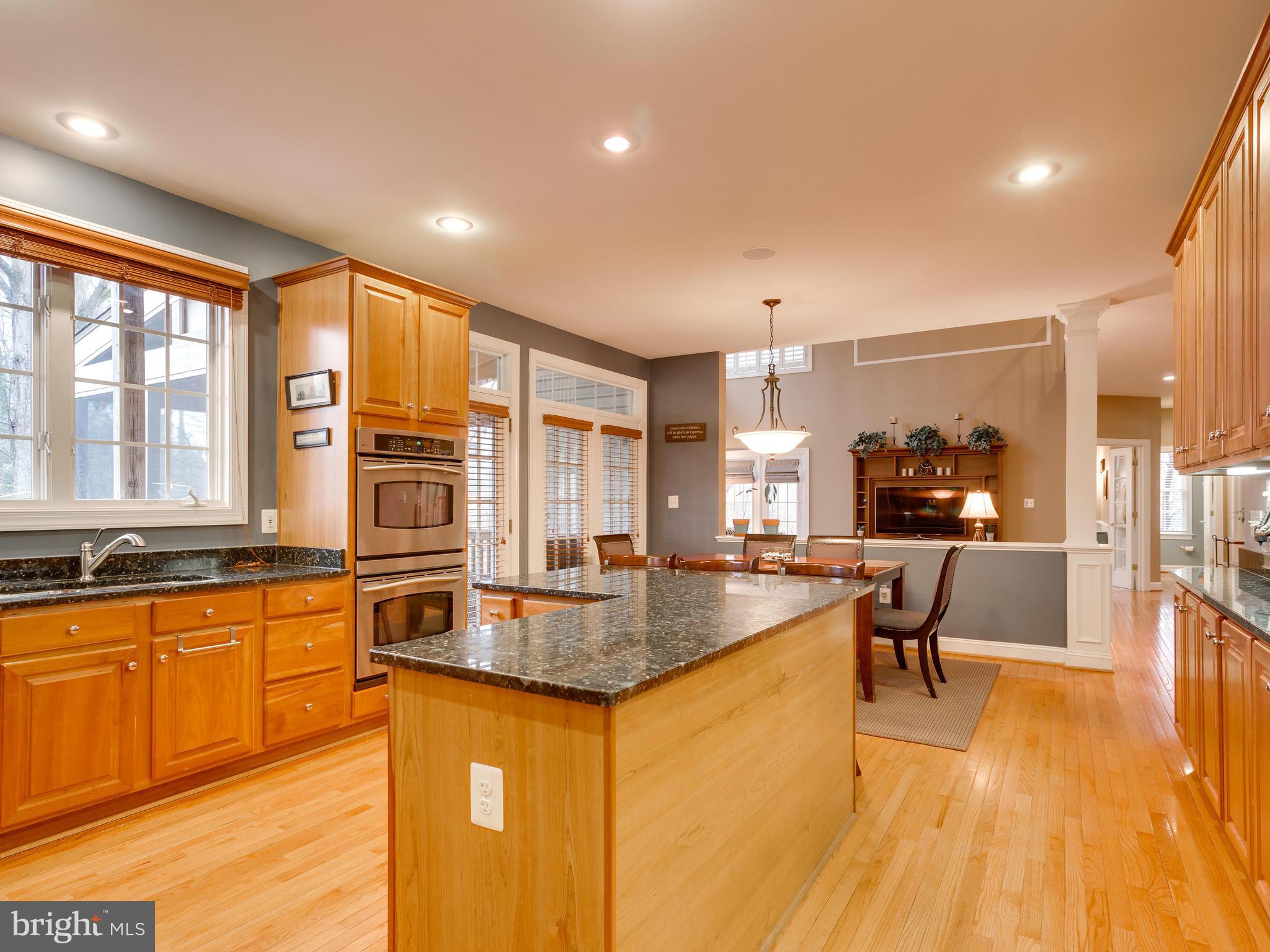 4013 Laurel Road Alexandria, VA 22309 - Photo 12 of 30 a kitchen with stainless steel appliances granite countertop a stove and a sink