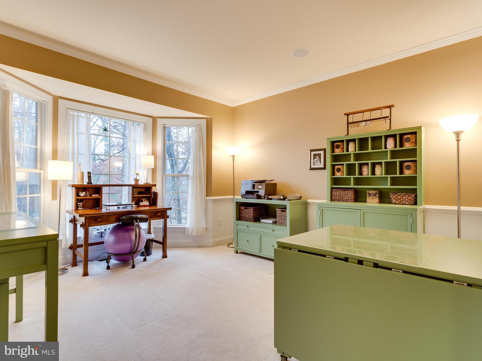 4013 Laurel Road Alexandria, VA 22309 - Photo 14 of 30 a view of a workspace with furniture and a window