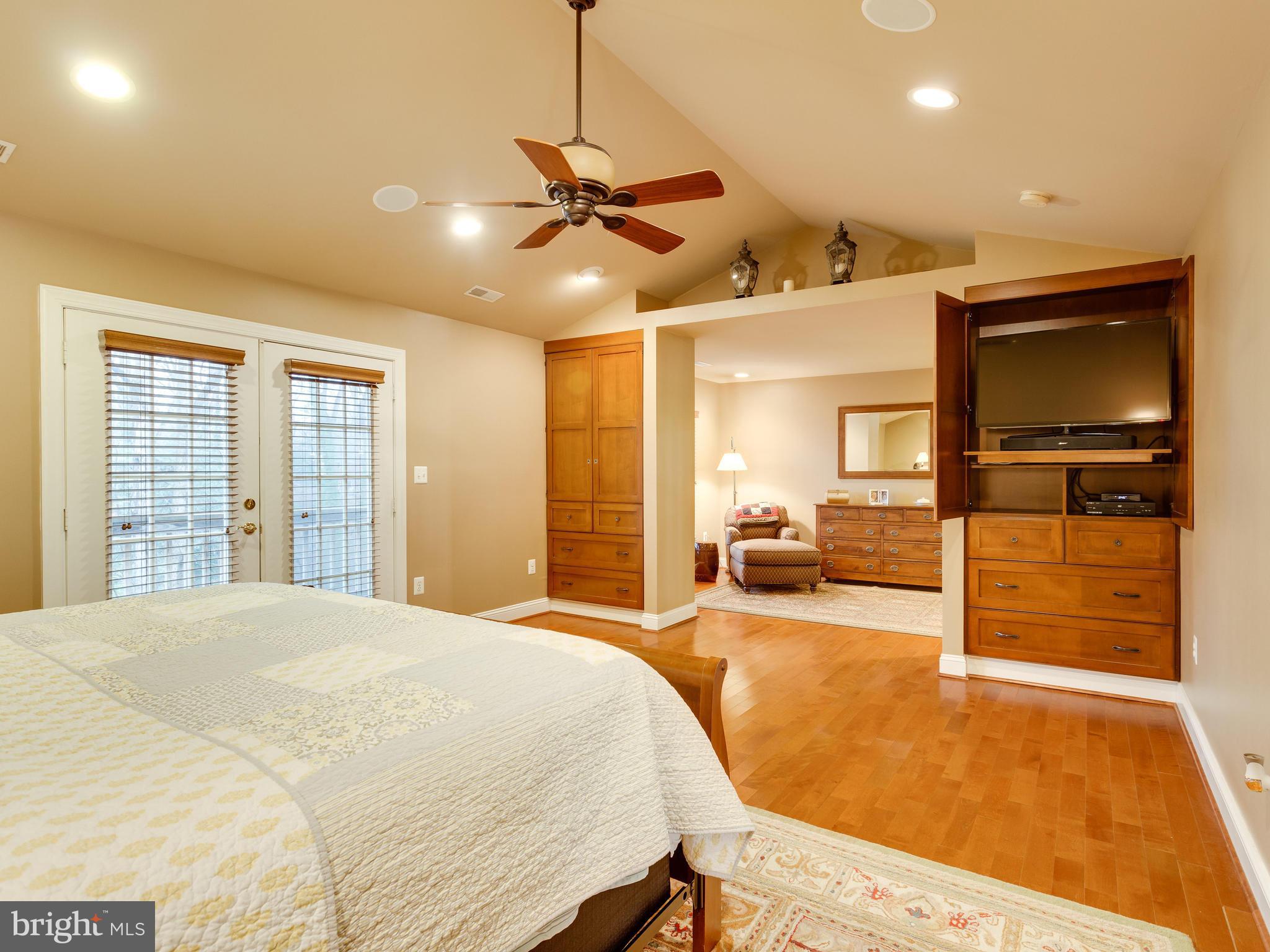 4013 Laurel Road Alexandria, VA 22309 - Photo 15 of 30 a spacious bedroom with a bed and ceiling fan