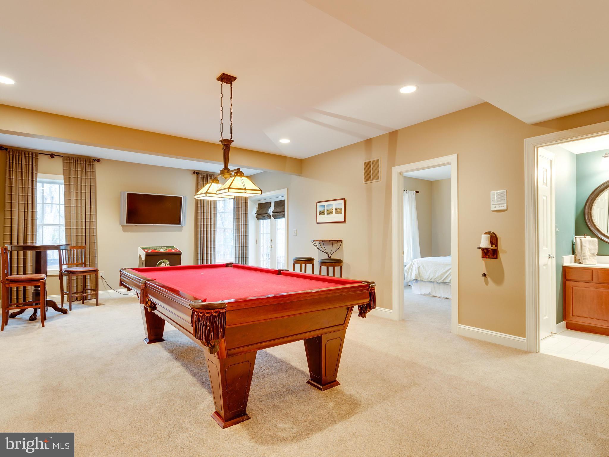 4013 Laurel Road Alexandria, VA 22309 - Photo 24 of 30 a living room with pool table and windows