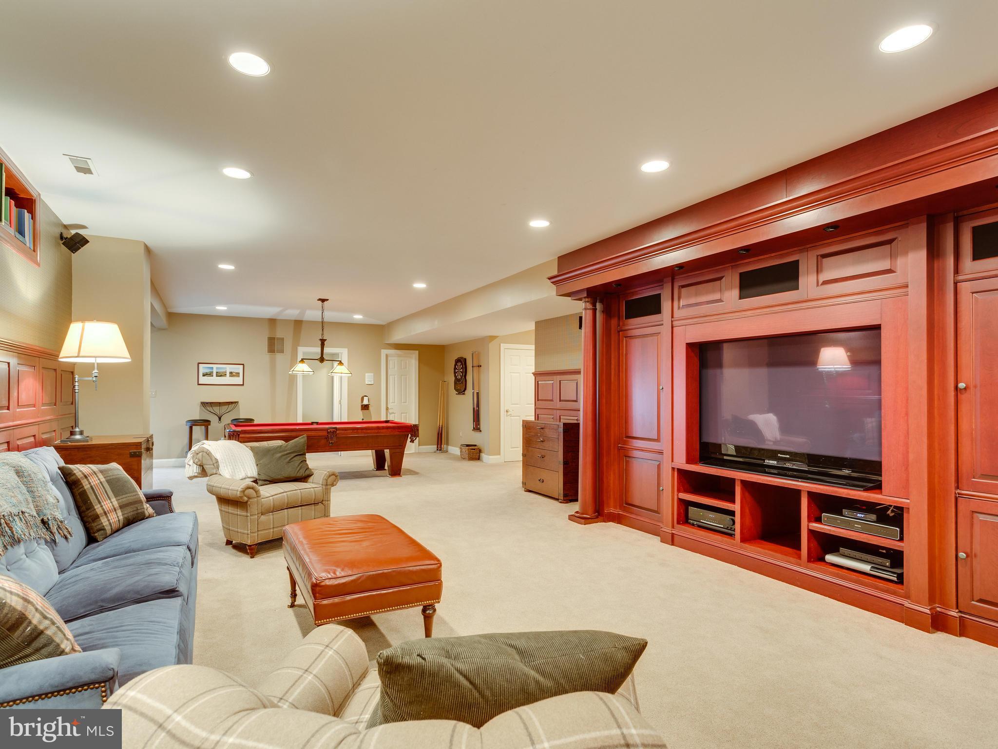 4013 Laurel Road Alexandria, VA 22309 - Photo 27 of 30 a living room with furniture and a flat screen tv
