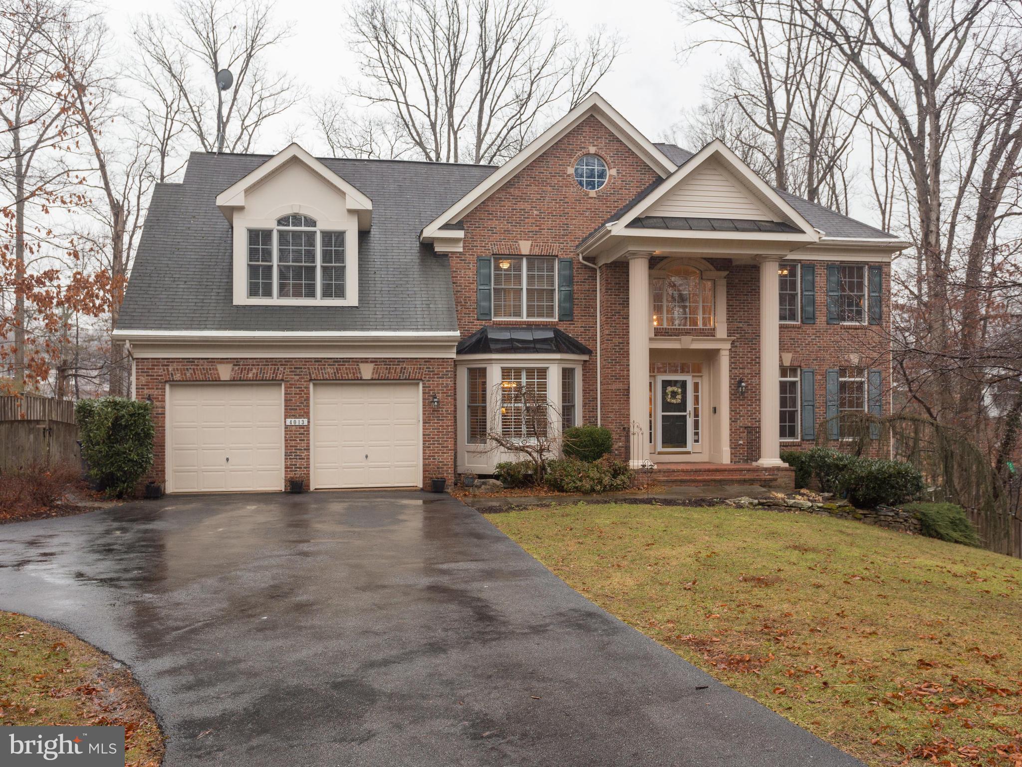 4013 Laurel Road Alexandria, VA 22309 - Photo 28 of 30 a front view of a house with a yard