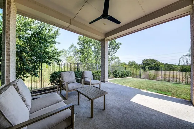 a view of yard with patio