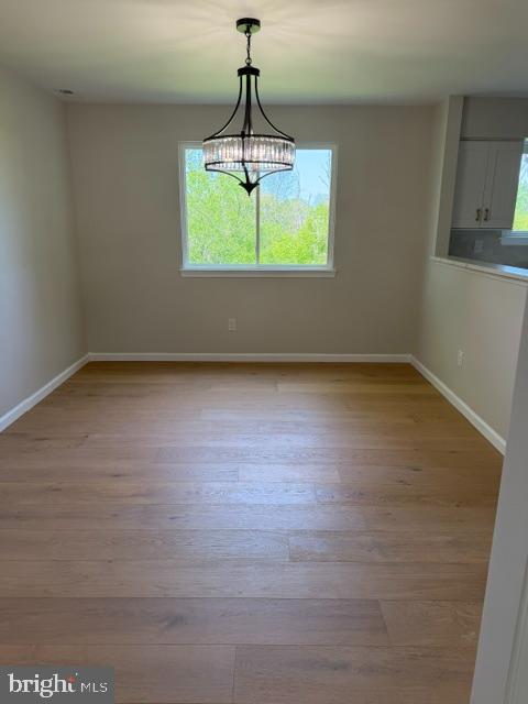 12 Wren Road Gilbertsville, PA 19525 - Photo 4 of 17 a view of empty room with wooden floor and fan