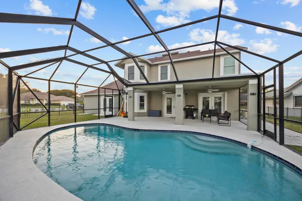 a swimming pool with outdoor view