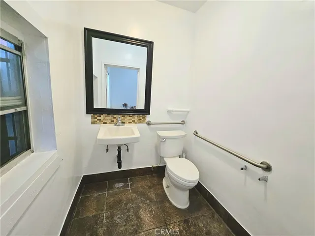 a view of a street with cars