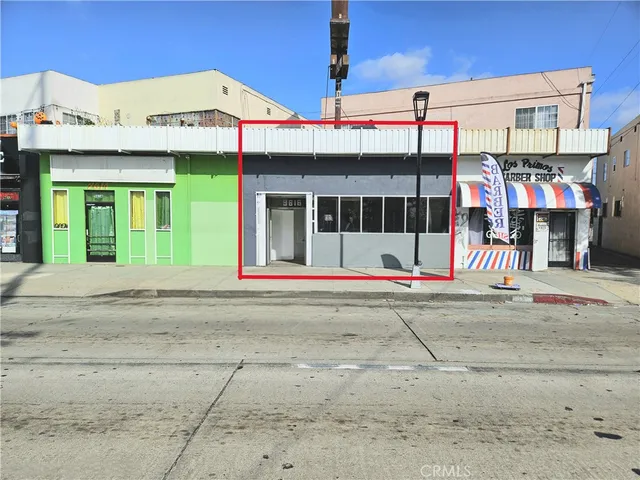 a view of a building with a street