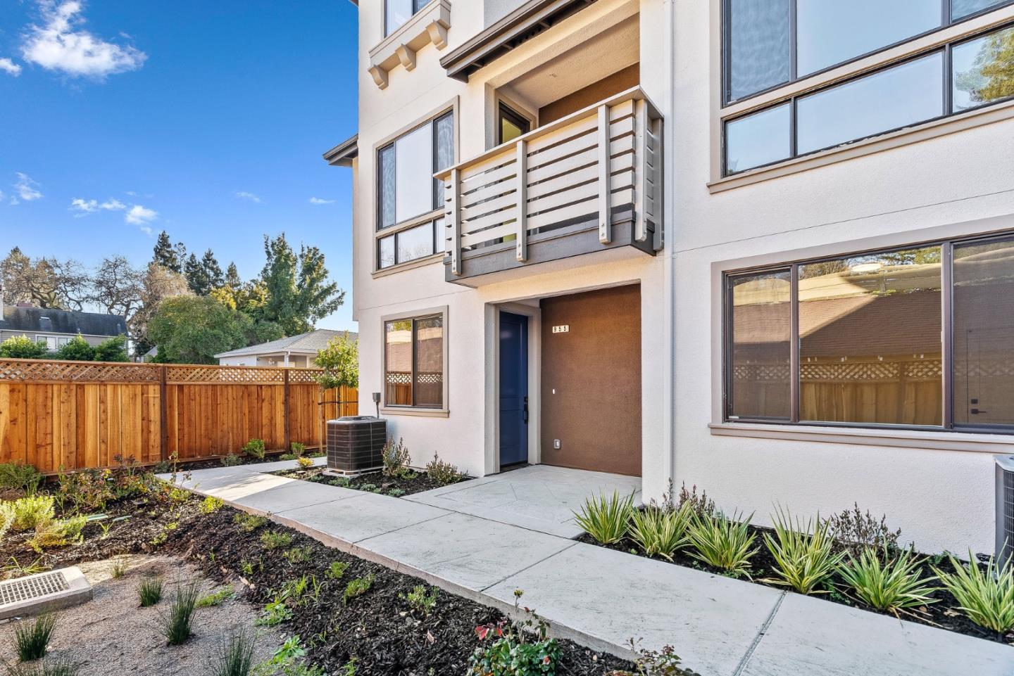 955 Woodside Road Redwood City, CA 94061 - Photo 4 of 46 a front view of a house