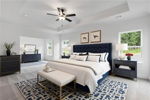 a bedroom with a bed and furniture