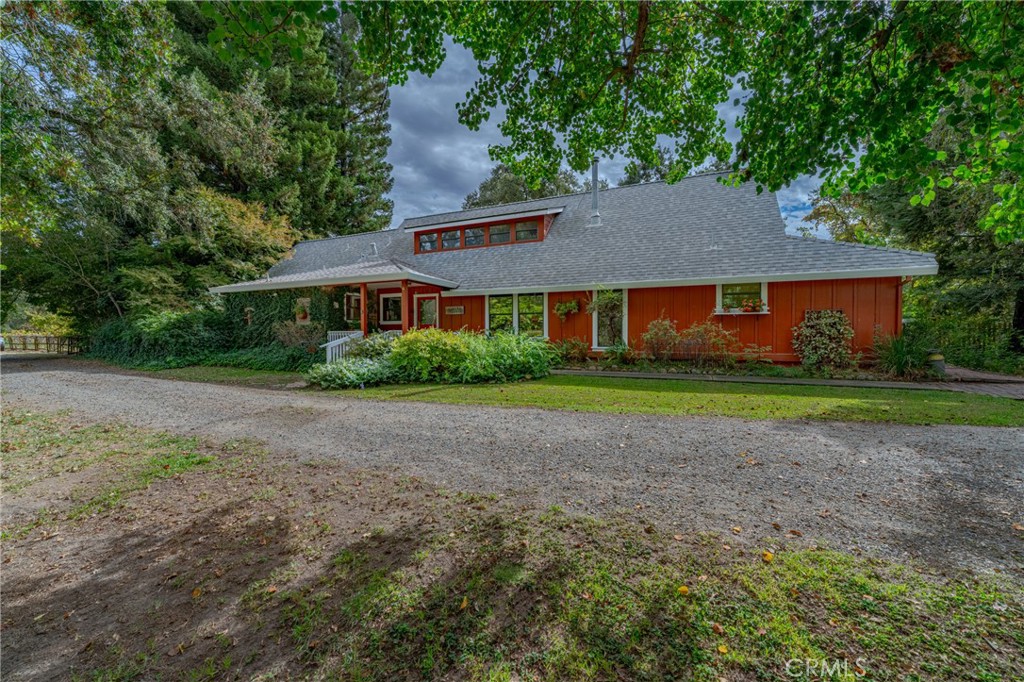 a house view with a garden space
