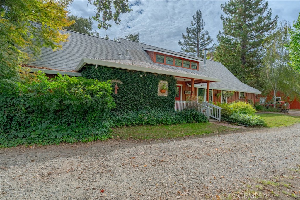 3279 Merced Falls Road Snelling, CA 95369 - Photo 2 of 73 front view of house with a yard and trees all around