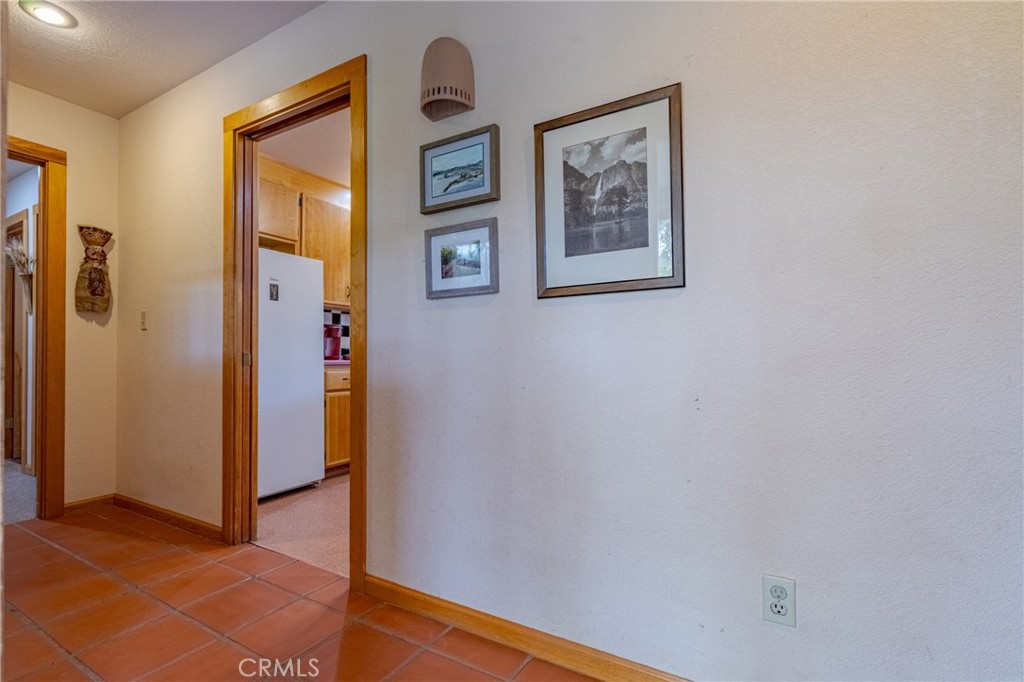 3279 Merced Falls Road Snelling, CA 95369 - Photo 41 of 73 a view of a hallway with wooden floor and closet