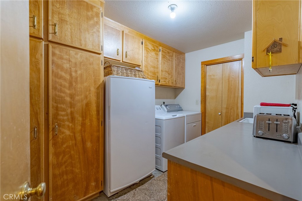 3279 Merced Falls Road Snelling, CA 95369 - Photo 43 of 73 a room with storage and utility