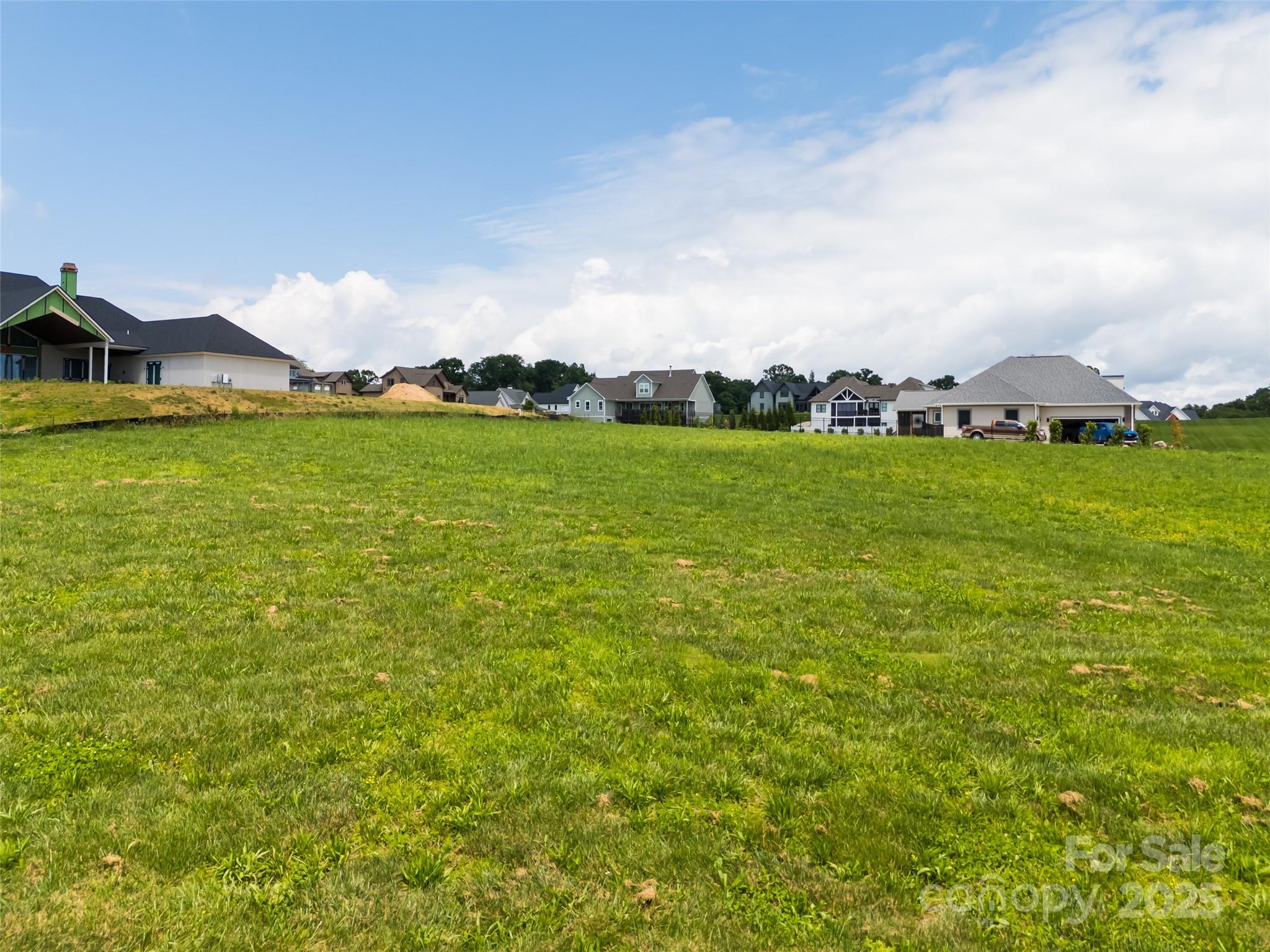 106 Double Knob Road, Unit LOT 64 Mills River, NC 28759 - Photo 17 of 19 a view of a town with residential houses