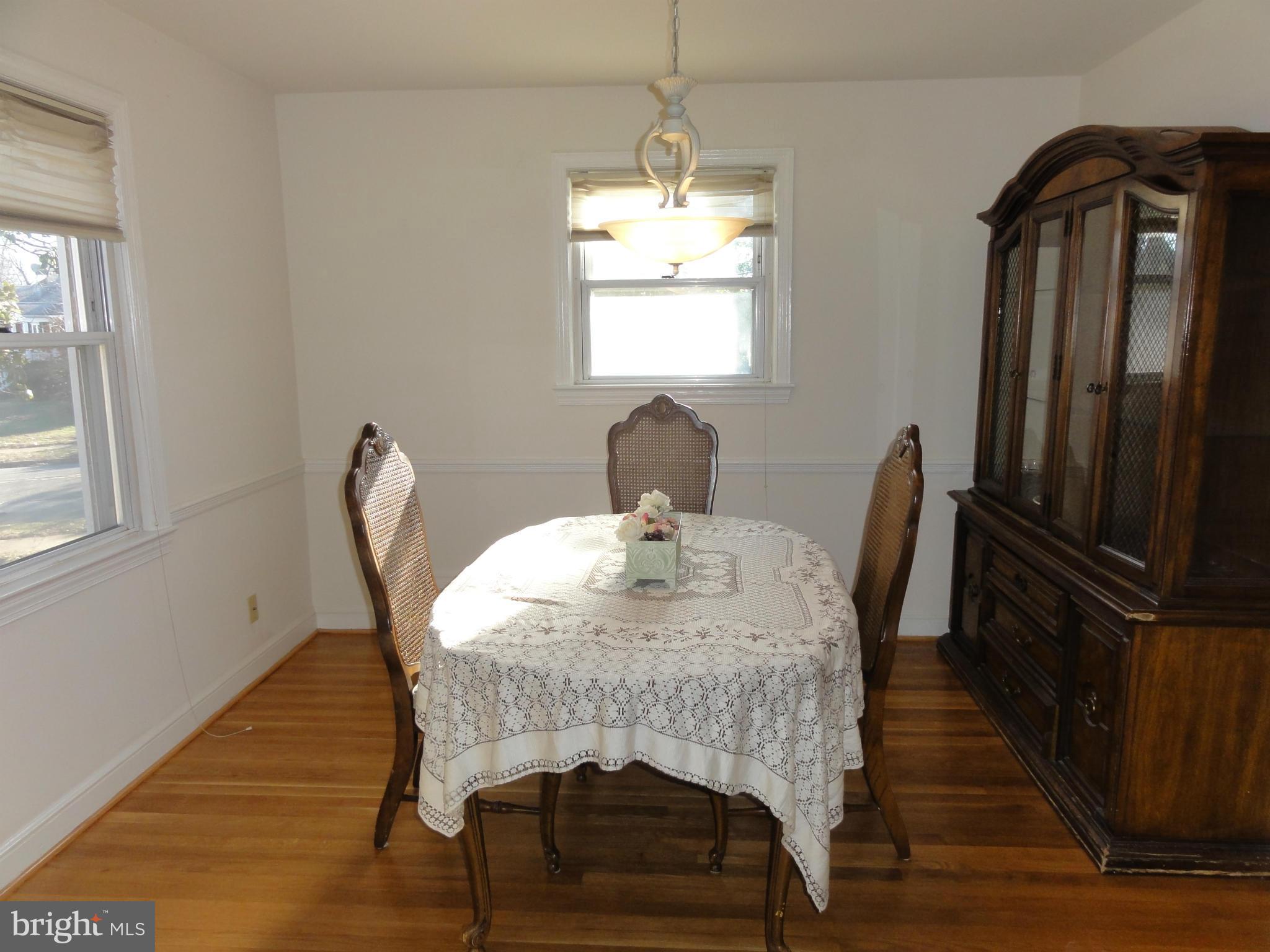 5912 Backlick Road Springfield, VA 22150 - Photo 11 of 28 a dining room with furniture and window