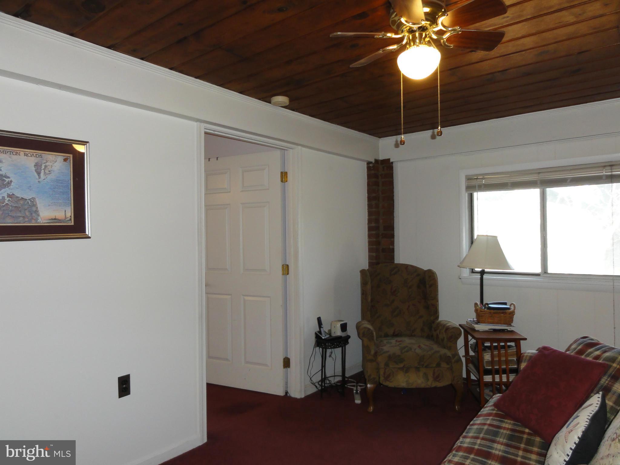 5912 Backlick Road Springfield, VA 22150 - Photo 18 of 28 a living room with furniture and a window