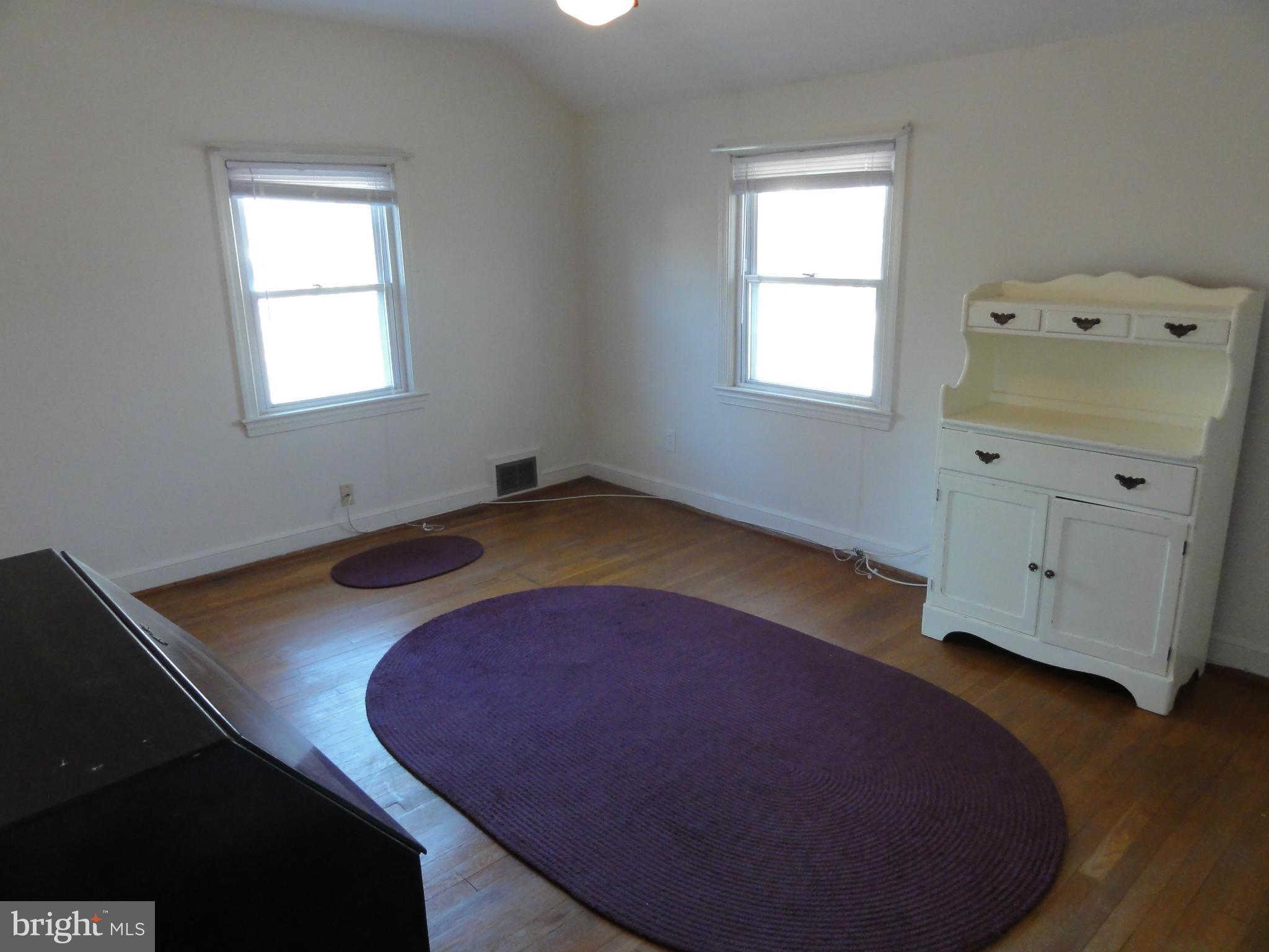 5912 Backlick Road Springfield, VA 22150 - Photo 25 of 28 an empty room with a window