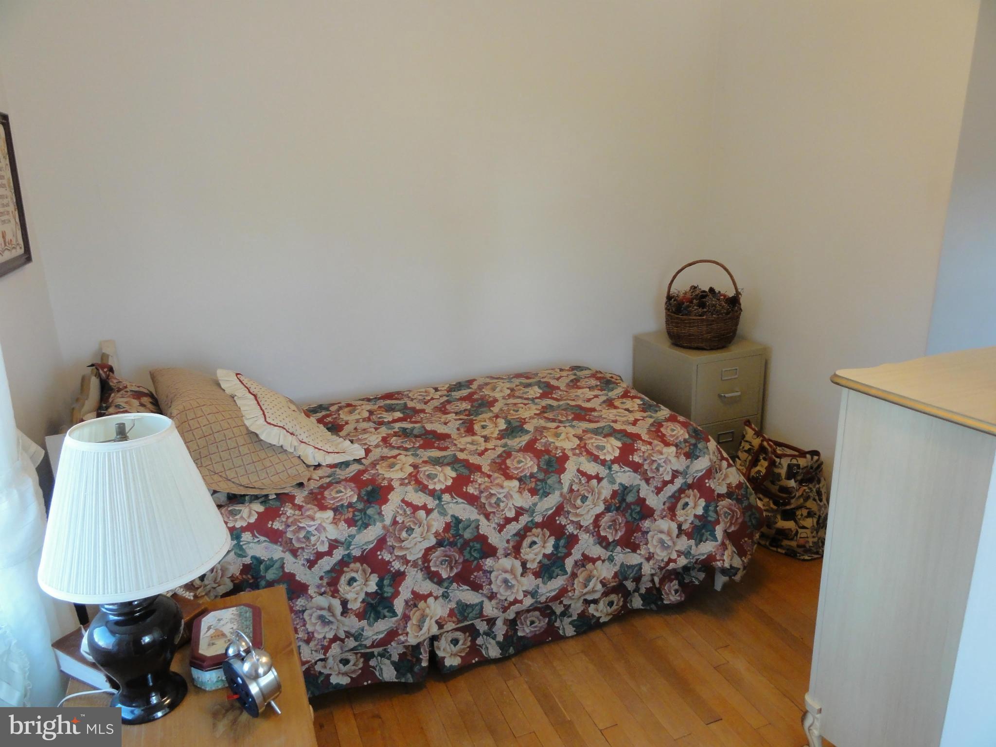 5912 Backlick Road Springfield, VA 22150 - Photo 27 of 28 a bedroom with a bed and a window