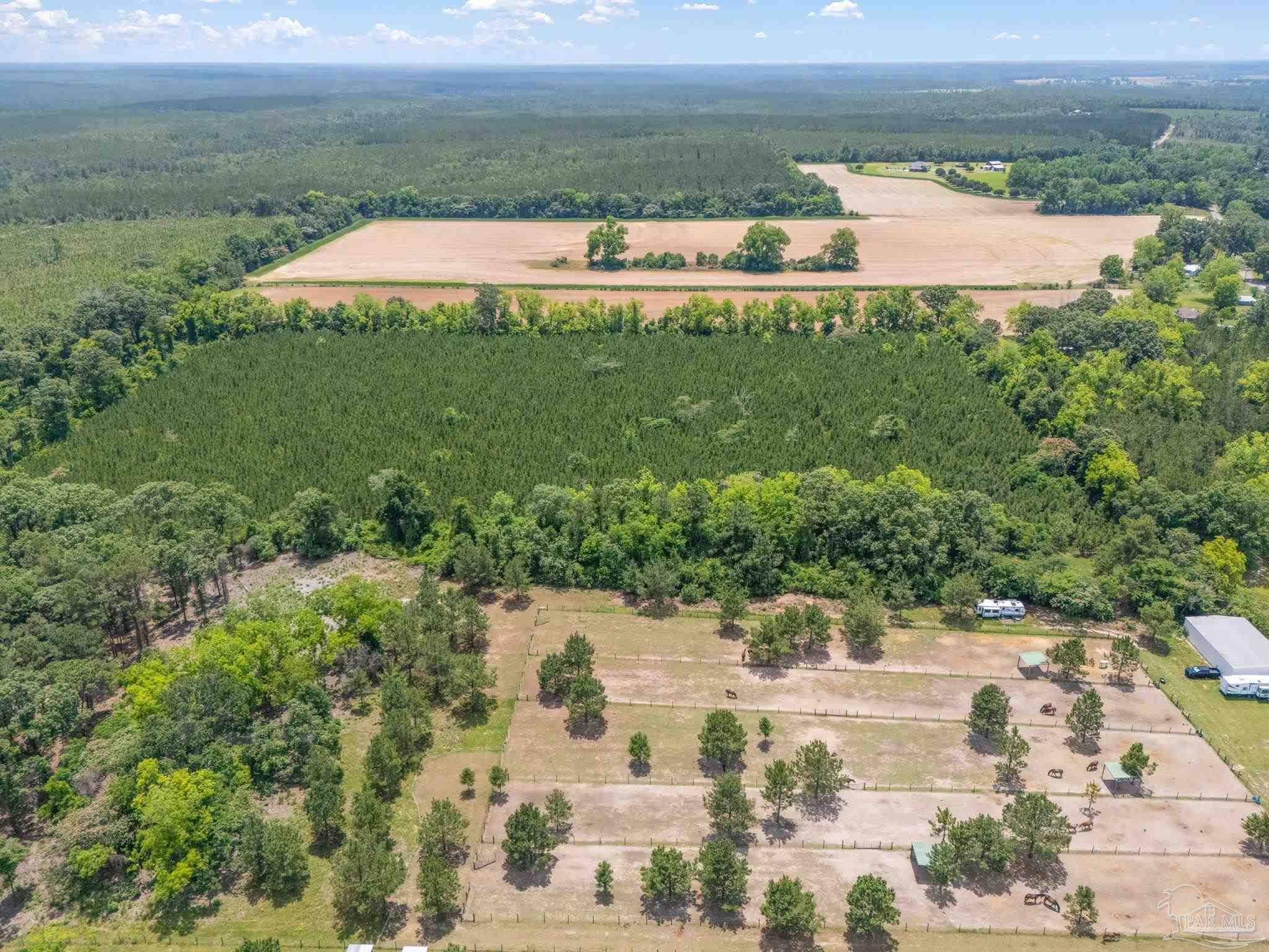 0 Lewis Road Milton, FL 32570 - Photo 13 of 14 a view of a lake with outdoor space